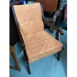 Antique style scroll design arm chair.