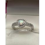 A Lovely example of a ladies 925 silver CZ and Opal panelled ring. [Ring size O]