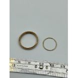A Gents 18ct gold wedding band [Ring size O] [Weighs 3.60grams] Together with a 9ct gold hoop