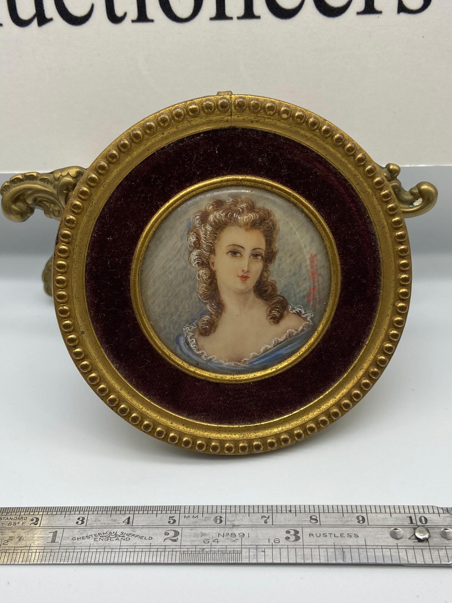 A Late 18th/ Early 19th century miniature portrait painting of a lady. Signed R Dumans. Fitted