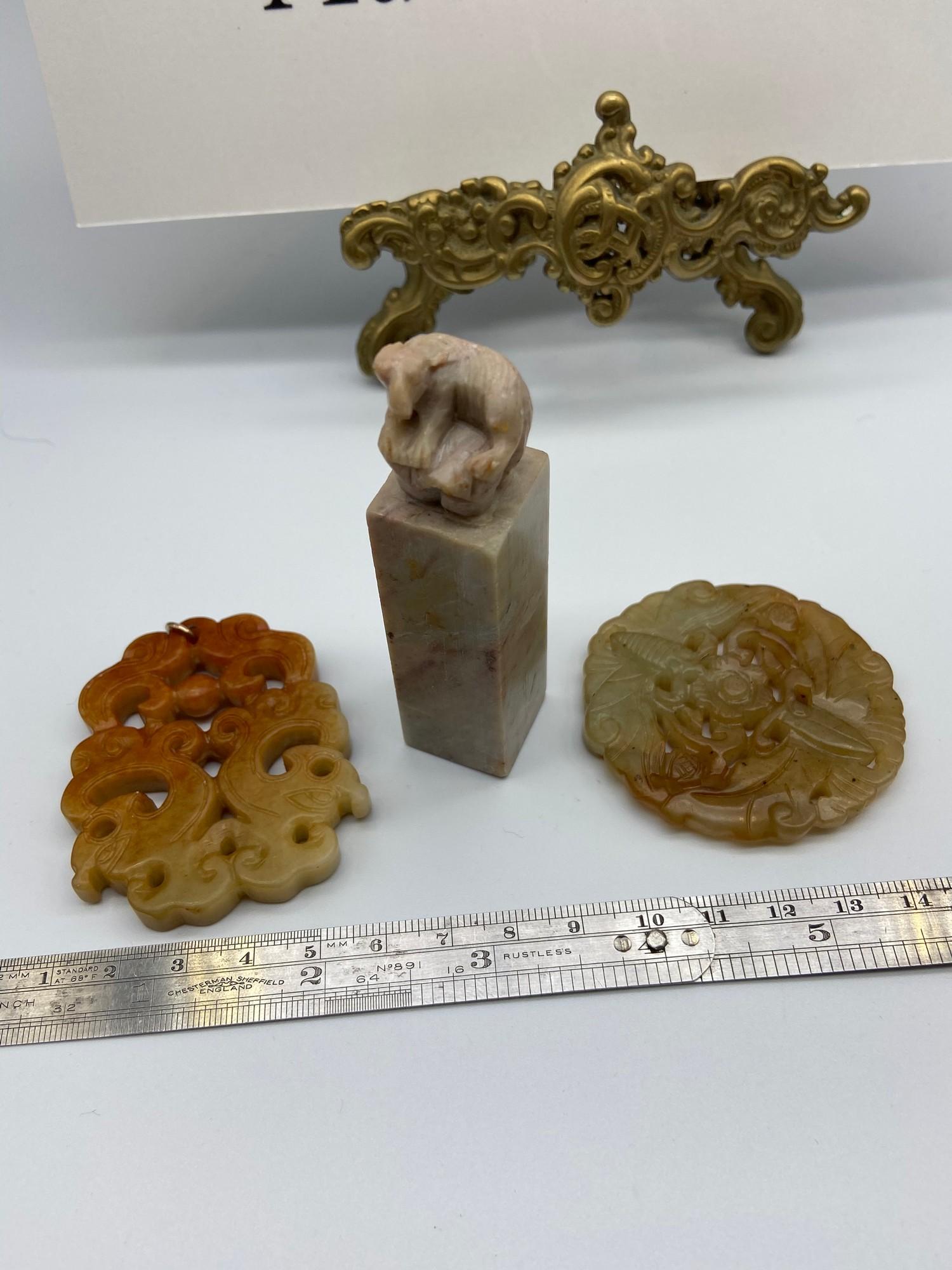 A Lot of three Chinese hardstone and Jade carvings. Which includes an ox topped seal.