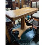A Victorian Maple wood rise and fall parlour/ study table.
