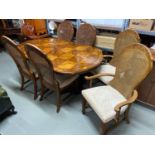 Antique style dining table together with 4 chair and two carvers. Chairs are designed with bergere
