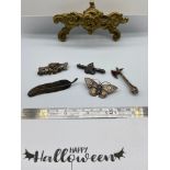 A Lot of 5 antique silver brooches. Includes Birmingham silver butterfly brooch with gold finishes.
