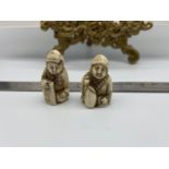 Two Japanese Meiji period hand carved ivory netsukes. Signed by the artist.