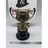 A Vintage Sheffield silver golf trophy cup. Designed with two handles and plastic style base.