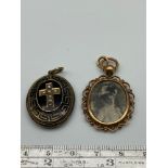 A Victorian Gold Mourning pendant together with a gilt metal, Cross, seed pearl and Greek key design