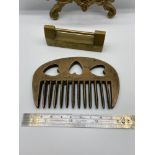 A Japanese Meiji period bronze hair comb. Together with a brass padlock.