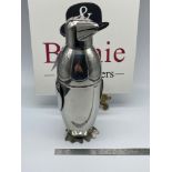 A Brushed Aluminium cocktail shaker in the form of a penguin. [22cm height]
