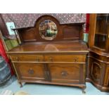 A Large Victorian Mahogany sideboard with mirror backing. Designed with two drawers and two doors