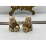 Two Japanese Meiji period ivory carved netsukes. Both signed