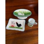 Two pieces of Wemyss G Hill [Two dishes] Together with an unmarked black cockerel small cup [
