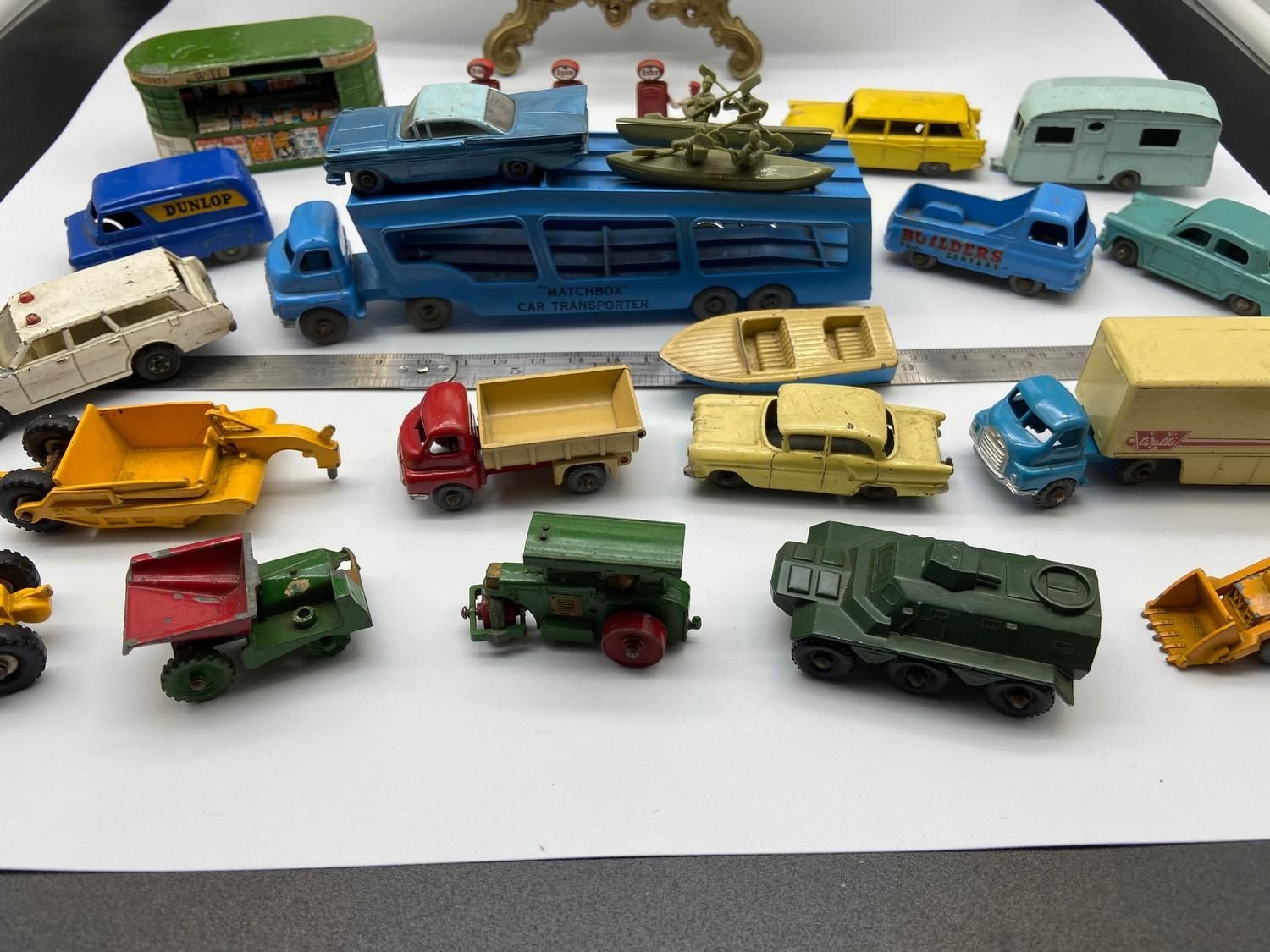 A Collection of vintage Matchbox Lesney Diecast models to include Newsagent stand and Esso fuel