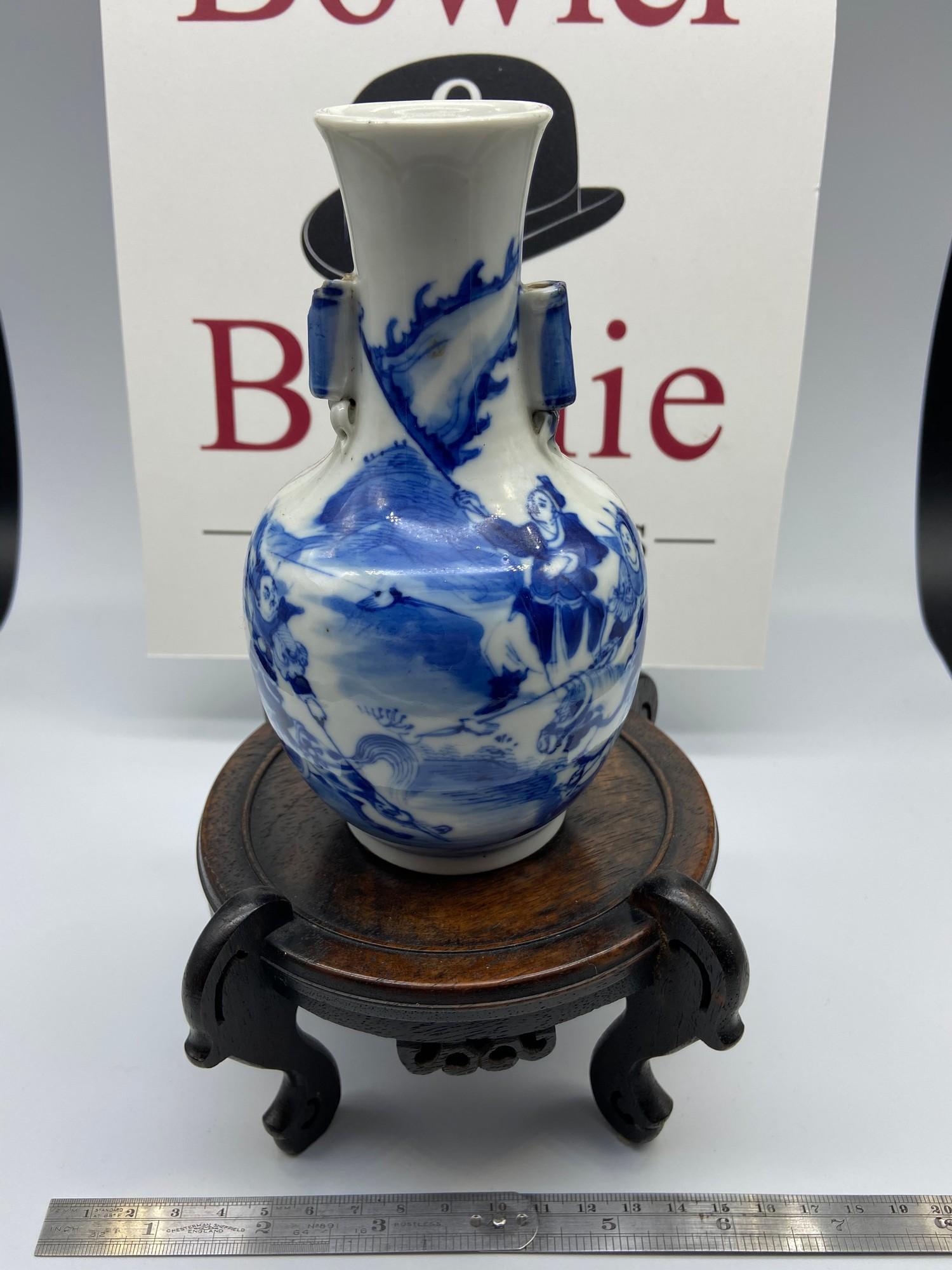 A 19th century Chinese blue and white vase. Together with a Japanese hardwood stand. [Vase 15cm