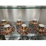 A Royal Crown Derby coffee set in an Imari pattern to include; cups, saucers and side plates [18]