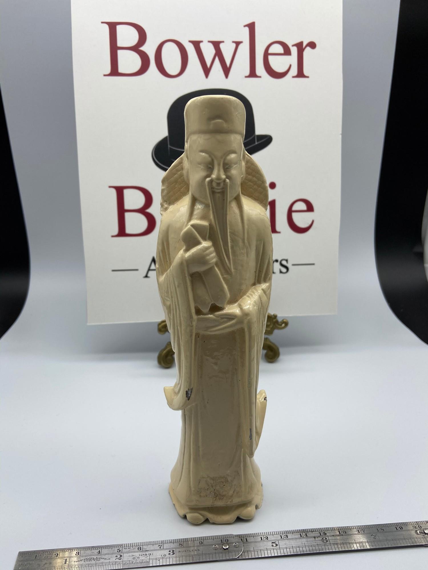 A large 19th century Chinese Jade carved scholar figure. [Painted over but showing no signs of