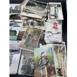 A quantity of mixed vintage postcards from around the world.