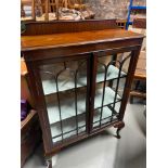 Antique two door mahogany china cabinet.