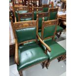 A Set of 8 Victorian solid oak and green leather dining chairs. Consists of 6 chairs and two