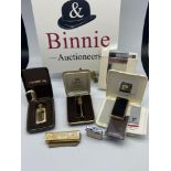 A lot of collectable lighters to include a boxed Pierre Cardin lighter as new, Playboy lighter,