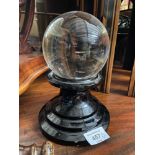 A Large antique witches ball and glass stand.