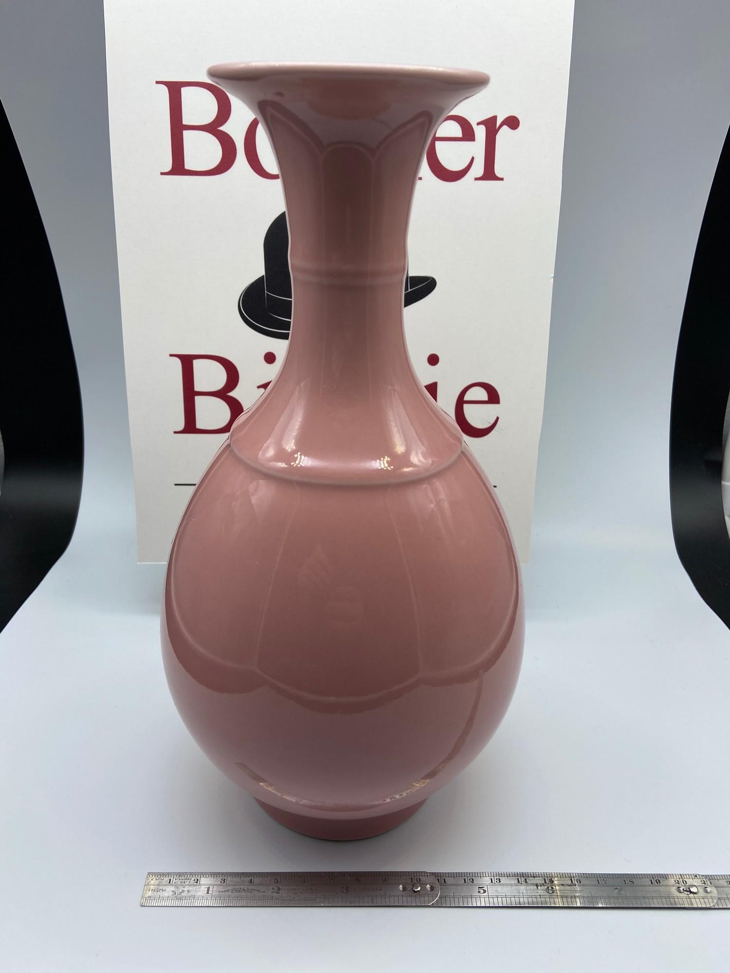 A 20th century Chinese pink glazed vase. Stamped with Da Qing Qianlong Nian Zhi 'Great Qing Qianlong