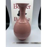 A 20th century Chinese pink glazed vase. Stamped with Da Qing Qianlong Nian Zhi 'Great Qing Qianlong