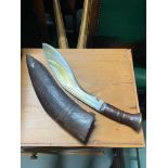 Antique [possibly military] Kukri knife with sheath.