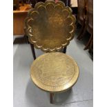 Antique impressive engraved brass wall hanging charger together with a British made Indian style