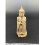 A 19th century hand carved ivory Thai Buddha figurine. [9cm height]