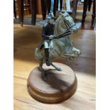 Antique heavy cast metal Napoleonic soldier on horseback.