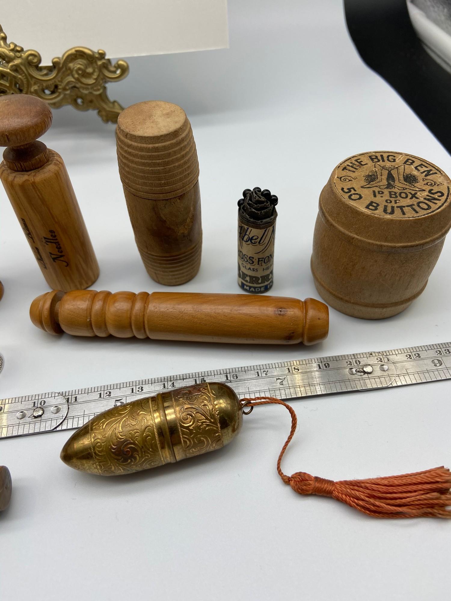 A Quantity of antique and vintage needle holders. Includes 925 silver needle holder, One in the - Image 3 of 4