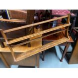 A Vintage Ercol elm wood shelving rack system.