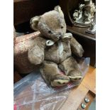A Large vintage Merrythought teddy bear with original Polly bag and tags. Never played with.