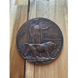 A WW1 Bronze death plaque. Belonging to 'Bernard Lynch'
