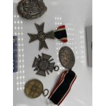 A Lot of 5 various German Nazi medals which includes WW2 Merit Cross, WW2 Merit medal, DRL Sports