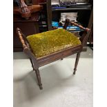 Antique lift top piano stool designed with turned leg supports