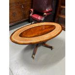 A William Tillman style lounge table designed with mustard leather section top
