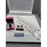 A Selection of antique and vintage silver jewellery which includes a Queen Victoria 3 Pence piece
