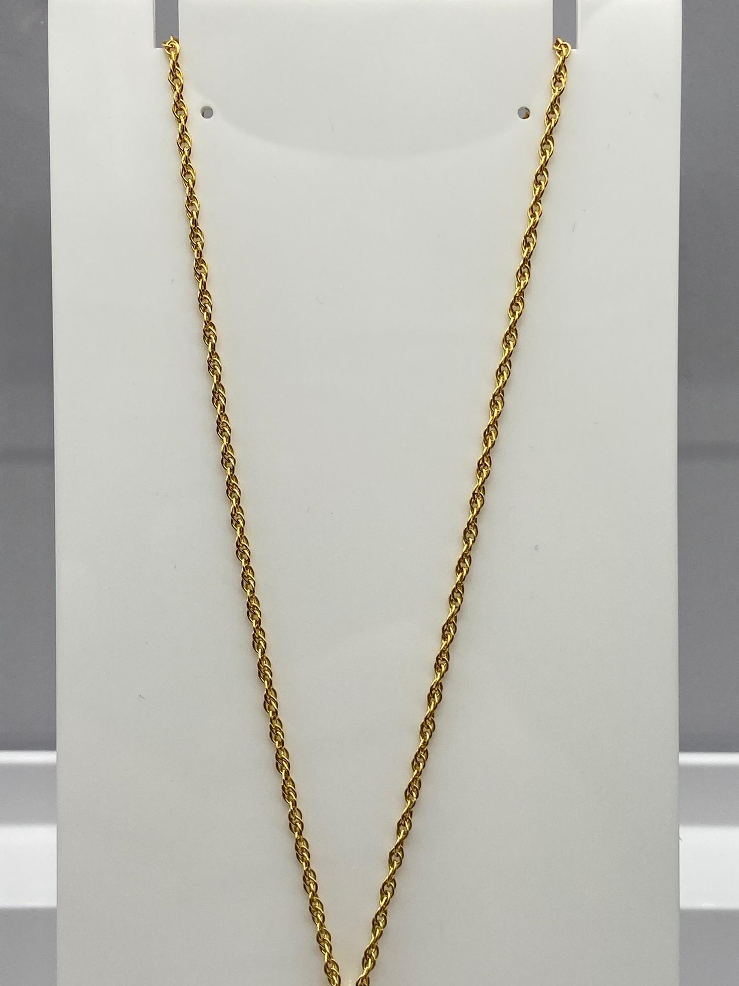 A Ladies 9ct gold necklace together with a 9ct gold and Smokey Quartz stone pendant. [Chain 45cm - Image 4 of 4