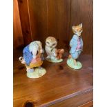 A Lot of Three Beswick 'Beatrix Potter' Figures which includes 'Tommy Brock, Old Mr Brown and Foxy