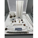 A Quantity of various silver jewellery which includes silver and brown stone swivel fob, Egyptian