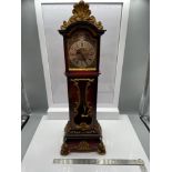 A Miniature 8 day grandfather clock. In a working condition. [33cm in height]