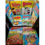 A Lot of 8 vintage Beano annuals dated 1980, 82,83,85,86,87,88 & 89.