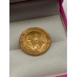 A Gold 1913 Half sovereign coin.