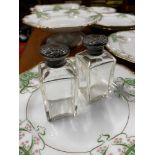 A Pair of London silver topper perfume bottles