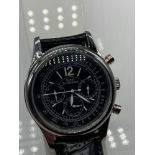 A Gents 25 jewel wrist watch bearing the name Daniel Jean Richard, designed with a leather strap. In