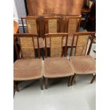 A Set of six Ratten back support G-Plan dining chairs.