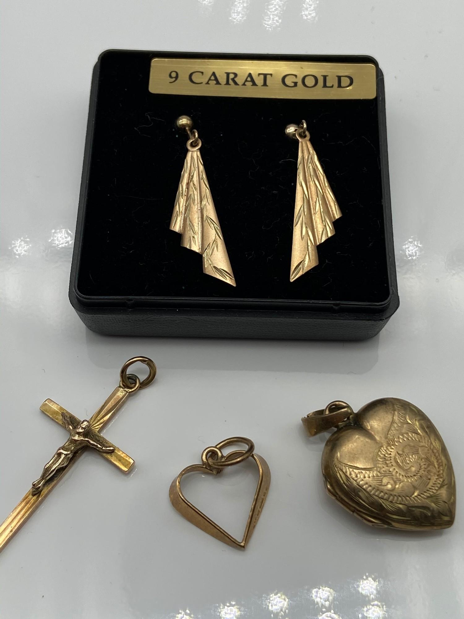 A Pair of 9ct gold earrings, A 9ct gold crucifix pendant, 9ct gold heart pendant and a 9ct gold back - Image 3 of 3