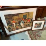 Two framed antique style prints of people celebrating and dining.